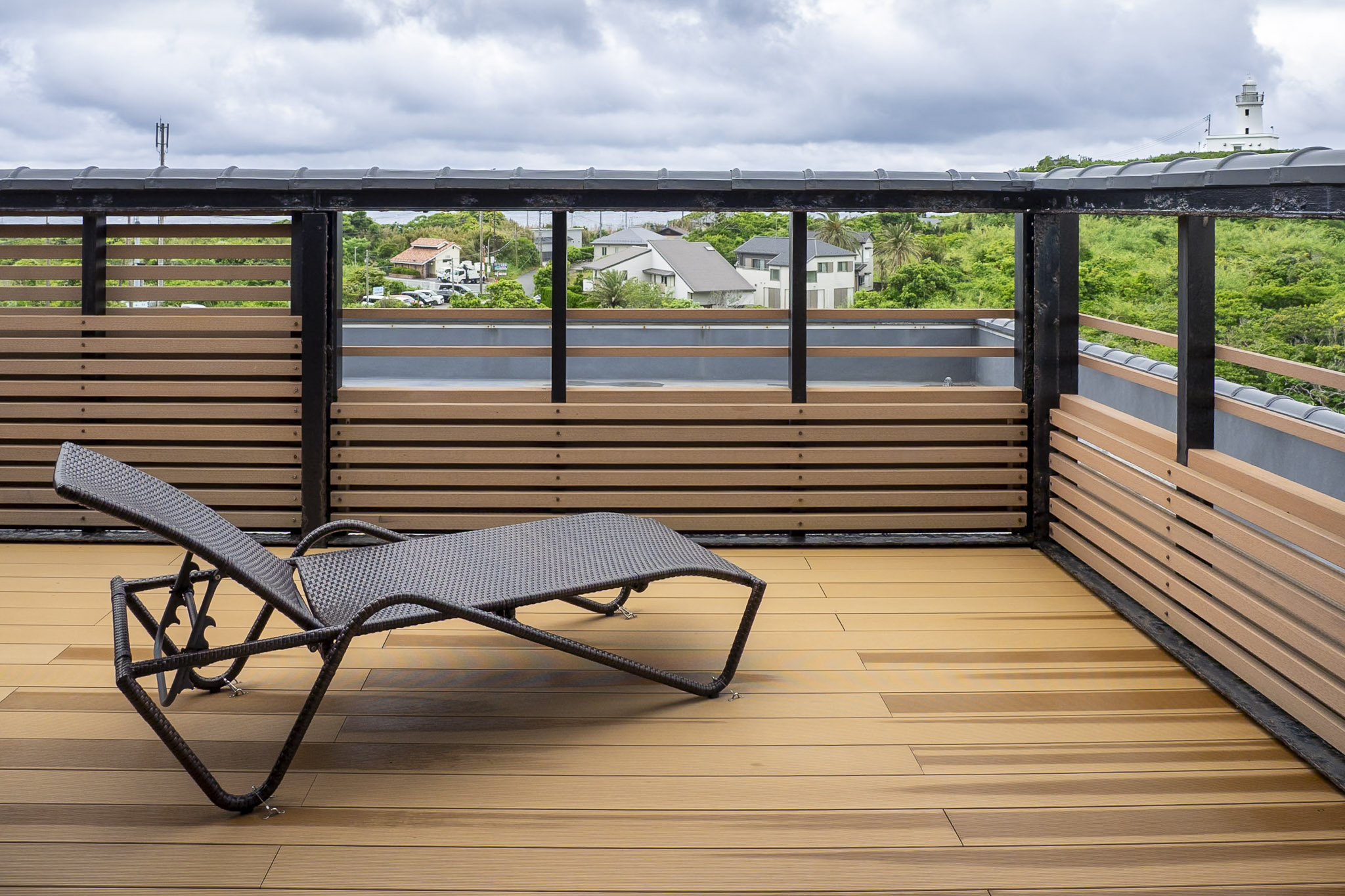 Private terrace with a lounge chair at the Narai Room at Hotel Sunosaki Kazenosho in Tateyama, Chiba